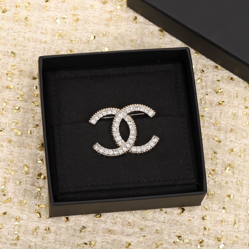 Ch**el brooches